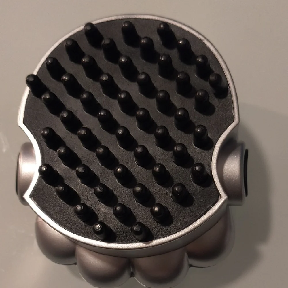Paw Pet Massager. Quiet, safe and non threatening to pets.
